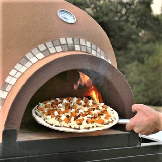 THE AUTHENTIC WOOD FIRED AL FRESCO GRANDE OVEN WITH DOOR, THERMOMETER AND CHIMNEY.