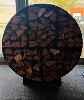 SPECIAL: PERFECT FOR STORING WOOD, THE ARCHITECTURAL ROUND LOG STACKER.