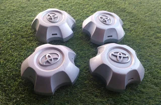 04 X OEM CENTER CAPS FOR TOYOTA LAND CRUISER