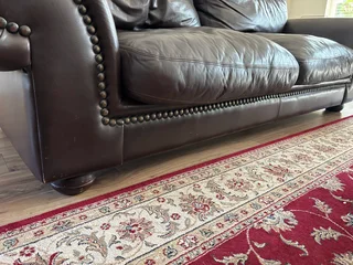 Classic brown Coricraft Leather Couch with studs