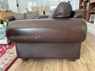 Classic brown Coricraft Leather Couch with studs