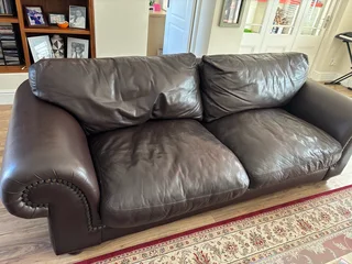 Classic brown Coricraft Leather Couch with studs