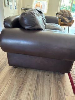 Classic brown Coricraft Leather Couch with studs