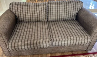 Immaculate and wonderfully comfortable 2 seater couch