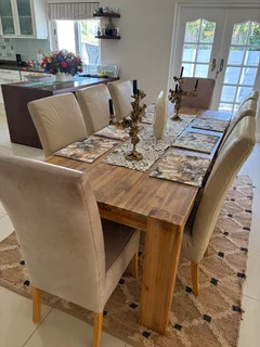 High-backed, Coricraft leather dining room chairs