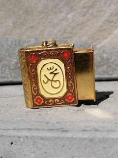 Gold colour Holy Quran tiny pendant