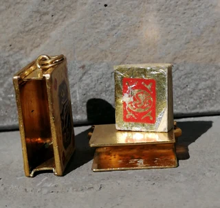 Gold colour Holy Quran tiny pendant