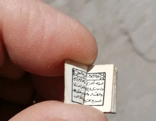 Gold colour Holy Quran tiny pendant