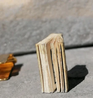 Gold colour Holy Quran tiny pendant