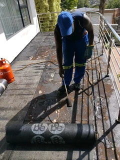 TORCHING ON WATERPROOFING AND RUBBER SEAL IT