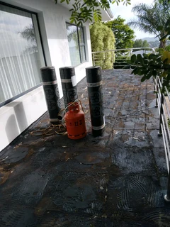 TORCHING ON WATERPROOFING AND RUBBER SEAL IT