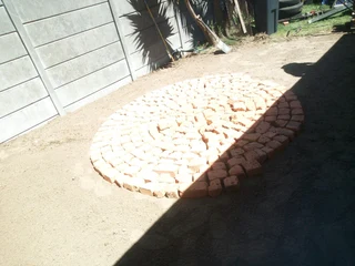 CIRCLE PATTERN OF HALF BRICK PAVING