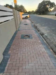 Red and charcoal colour paving