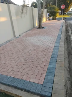 Red and charcoal colour paving