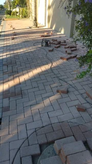 Red and charcoal colour paving