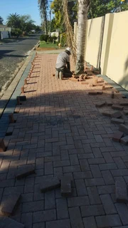 Red and charcoal colour paving