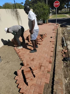 Red and charcoal colour paving