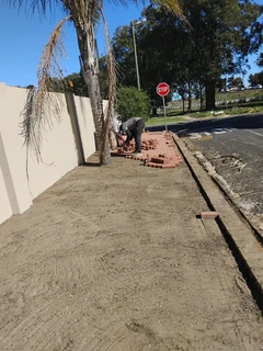 Red and charcoal colour paving