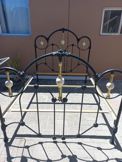 Double brass bed and single vintage single bed