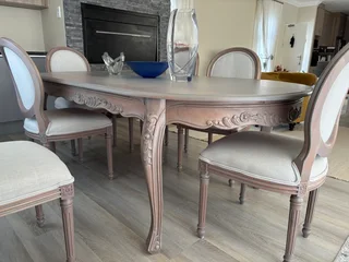 French style dining room table and 6 chairs