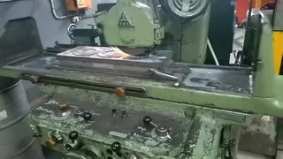 Toss surface grinder