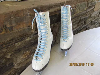 ICE SKATING BOOTS.