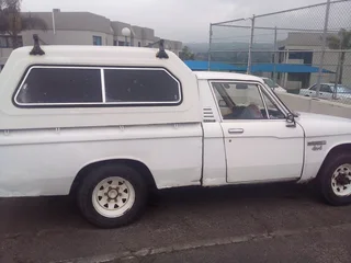 1980 Isuzu KB Series 4x4 Single Cab with Beukman canopy and tow bar