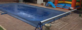 Pool cover roller