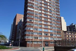 A lounge with no wall drop area for rent :Rent is R2000 at Dolphin court South  Beach