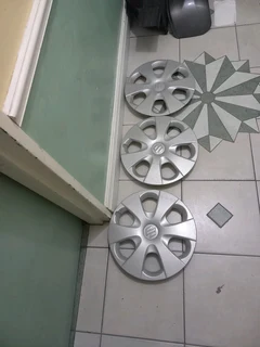 Three suzuki  14 inch hubcaps