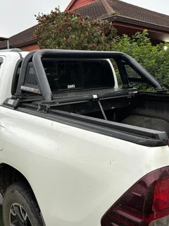 Secur lid and roll bar