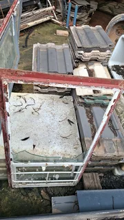 Small Steel Window with Burglar Bars – 530 × 950 mm