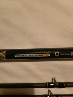 Black Loomis &amp; Franklin 13ft fishing rod