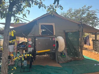 Howling Moon Trailer Tent Deluxe XT with Tailgate addition and sides for Tailgate and kitchen