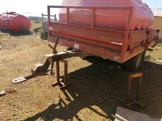 Tractor trailer almost new and plough for sale