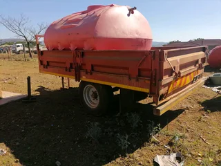 Tractor trailer almost new and plough for sale