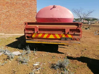 Tractor trailer almost new and plough for sale