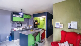 3 bedroom house, 2 baths, main bedroom upstairs,garage,outside entertainment/home office for sale