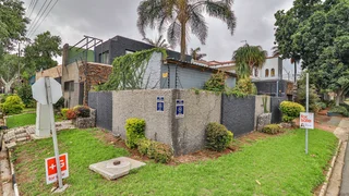 3 bedroom house, 2 baths, main bedroom upstairs,garage,outside entertainment/home office for sale