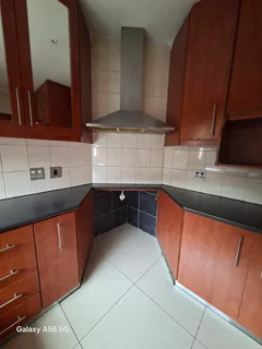 Cherry wood finish complete Melamine Kitchen cupboards and counters for sale