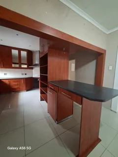 Cherry wood finish complete Melamine Kitchen cupboards and counters for sale