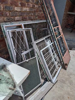 Various window and door frames &amp; security gates for sale