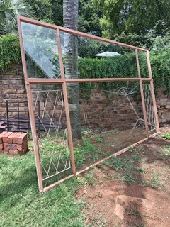 Various window and door frames &amp; security gates for sale