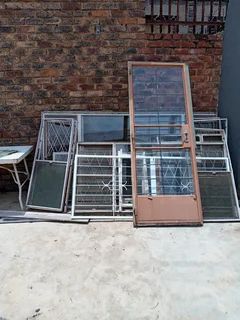 Various window and door frames &amp; security gates for sale