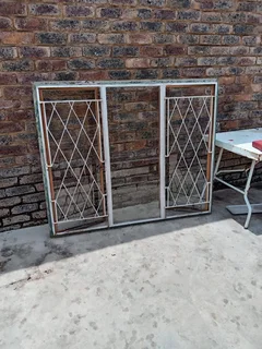 Various window and door frames &amp; security gates for sale