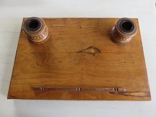Vintage oak writing top with two inkwells.