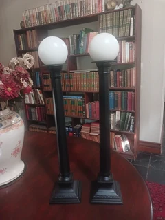 Large pair of black anodised candlesticks