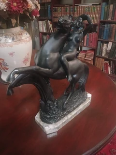 A Giannelli alabaster figurine, Nude on a Horse.