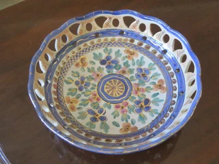 Multicoloured pierced Flora Gouda Holland glazed pottery dish.