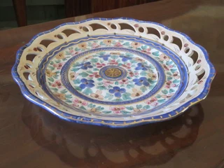 Multicoloured pierced Flora Gouda Holland glazed pottery plate.